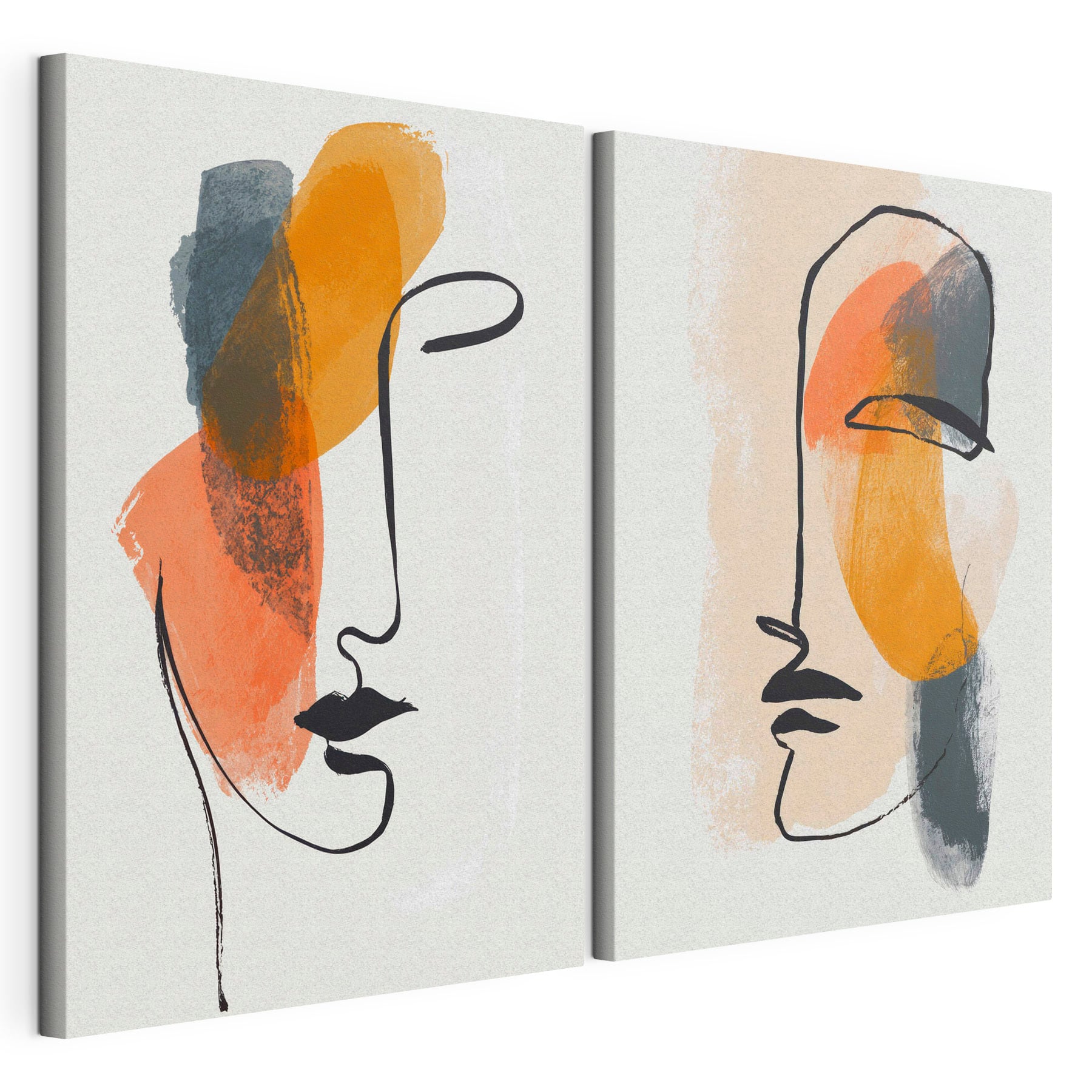 Two faces drawn on paper