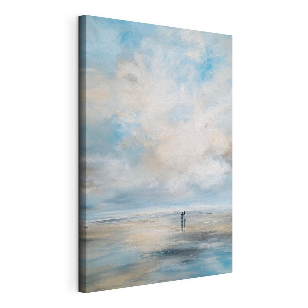 Couple of people standing on a beach