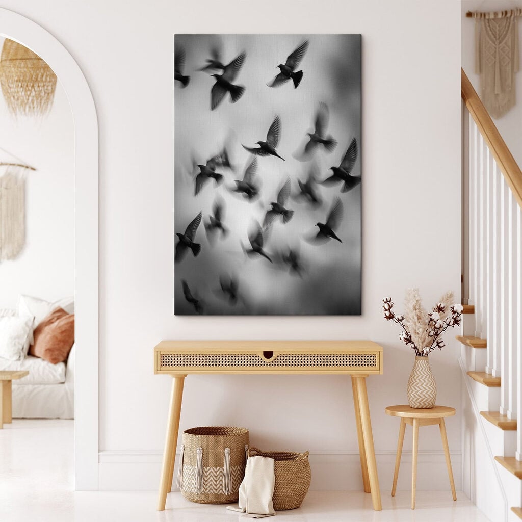 Flock of birds flying in the sky